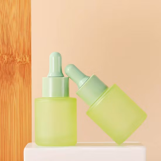 Botella de empaquetado colorida personalizada del cuidado del cabello de las botellas de vidrio del suero del diseño